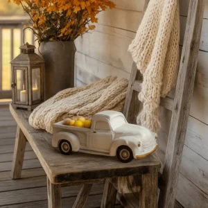 White, green and gold vintage pickup truck candle with fall-inspired scents