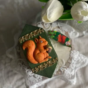 Scented candy-shaped candle with a vintage squirrel design, handmade decorative candle from the Nostalgia Collection.
