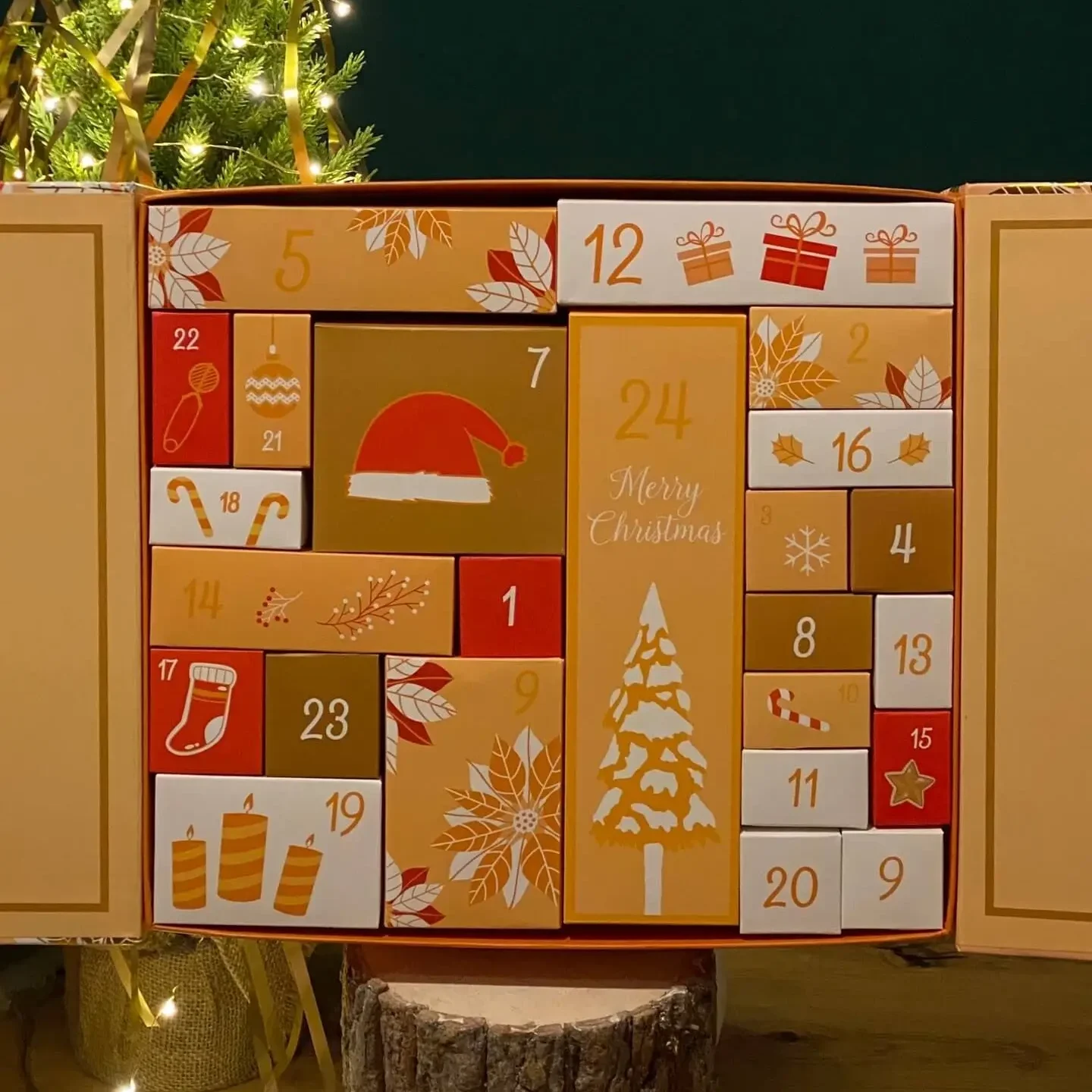24-day home fragrance advent calendar with mini and full-size candles, diffusers, aroma sachets and fragrance products.
